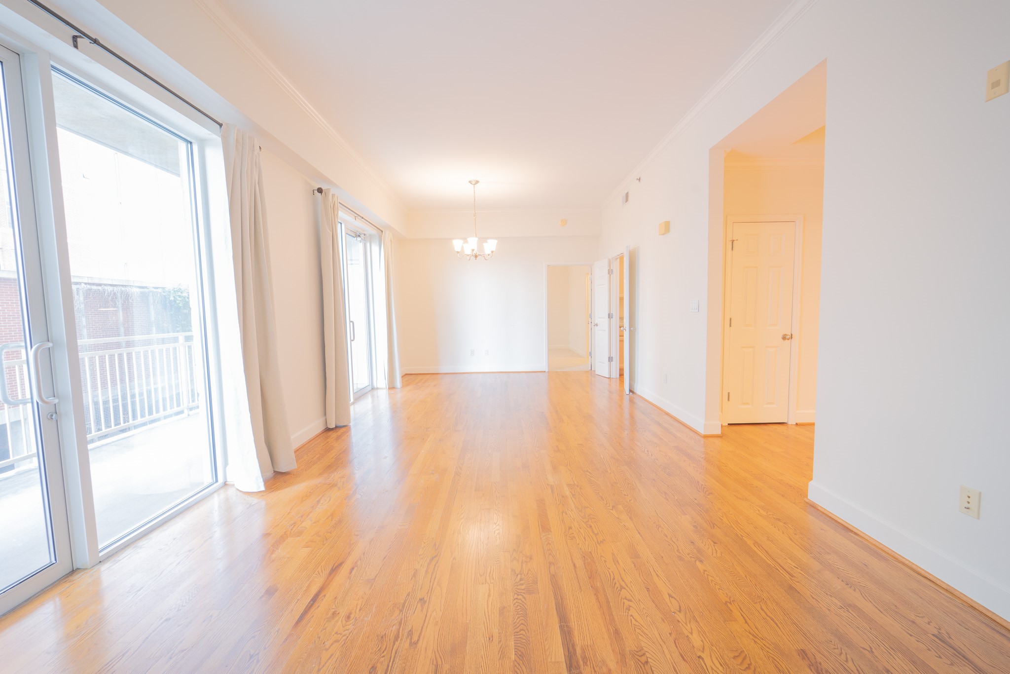 2520 Robinhood Street, Unit 505 Houston, TX 77005 - Photo 12 of 37 a view of empty room with wooden floor and fan
