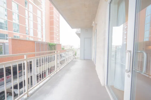 a view of a balcony with city view