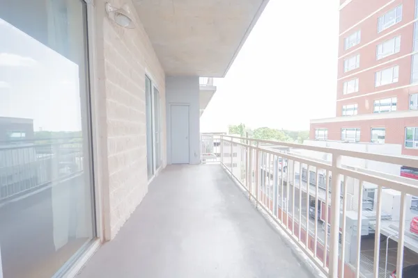 a kitchen with kitchen island a counter top space a stove and cabinets