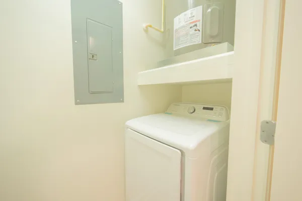 a view of an empty room with a window