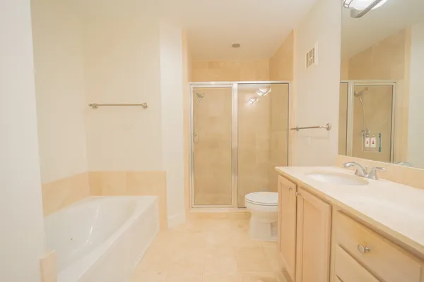 a bathroom with a sink a vanity and a mirror