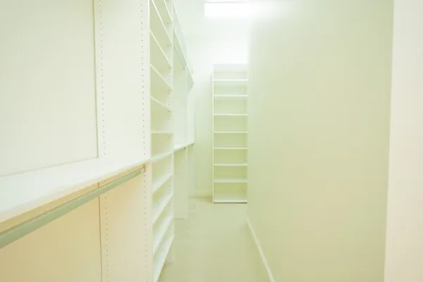 a view of a patio with table and chairs and potted plants