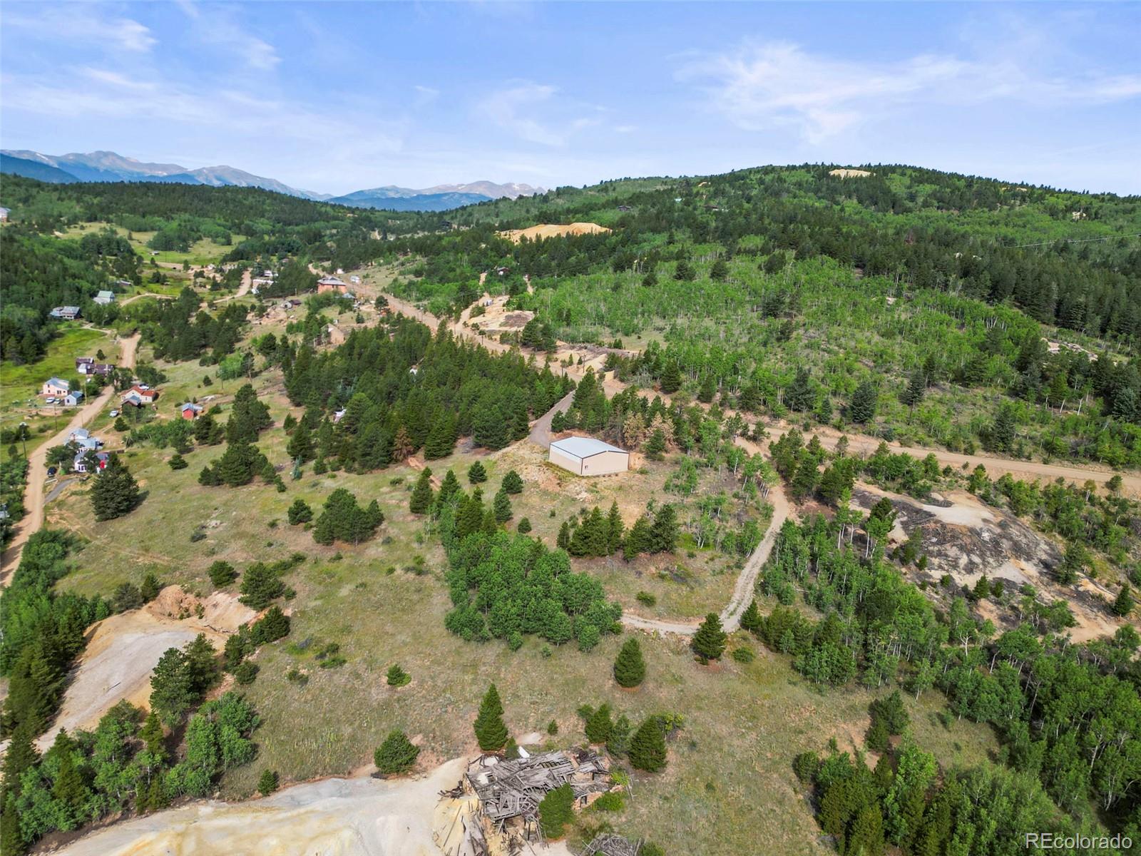 6660 Virginia Canyon Road Central City, CO 80427 - Photo 16 of 31 a view of a city with mountains in the background