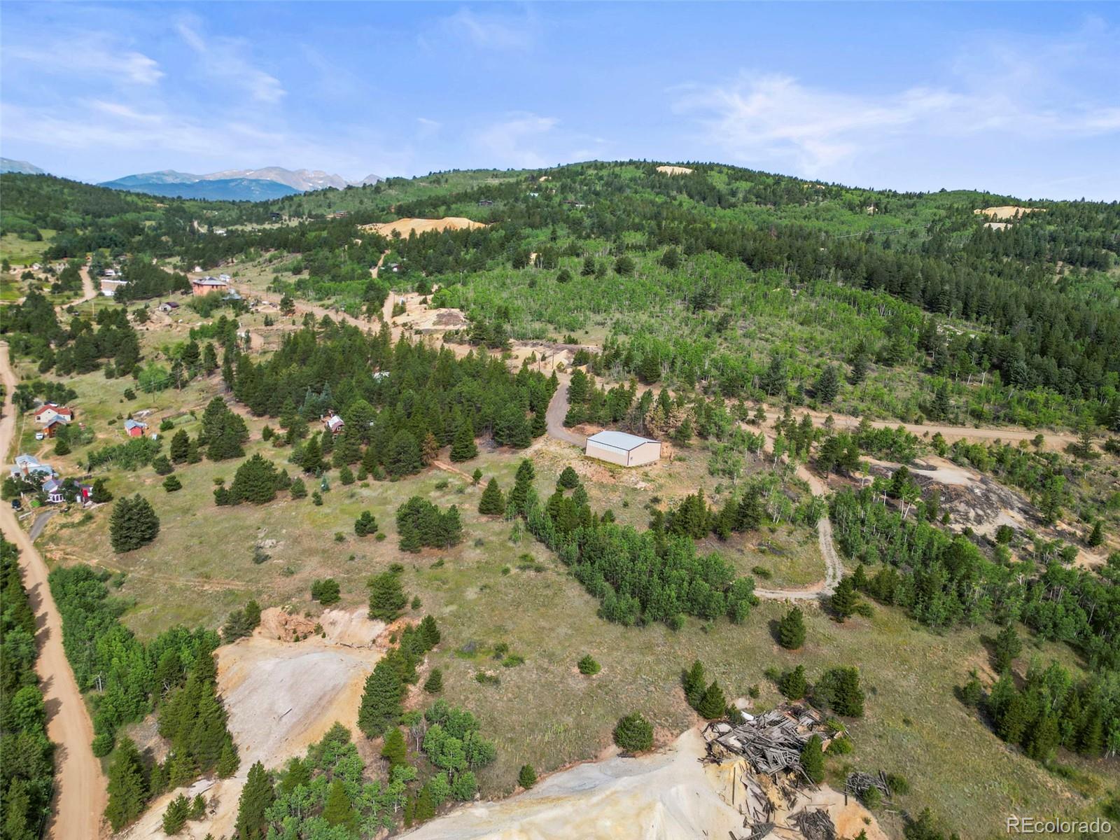 6660 Virginia Canyon Road Central City, CO 80427 - Photo 17 of 31 a view of a city with mountains in the background