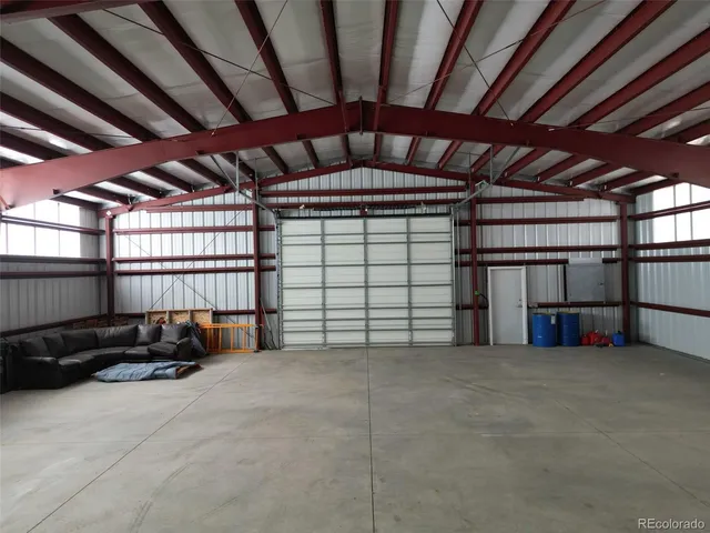 a view of a garage with furniture