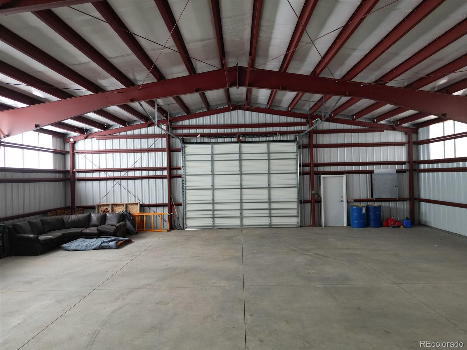 6660 Virginia Canyon Road Central City, CO 80427 - Photo 25 of 31 a view of a garage with furniture