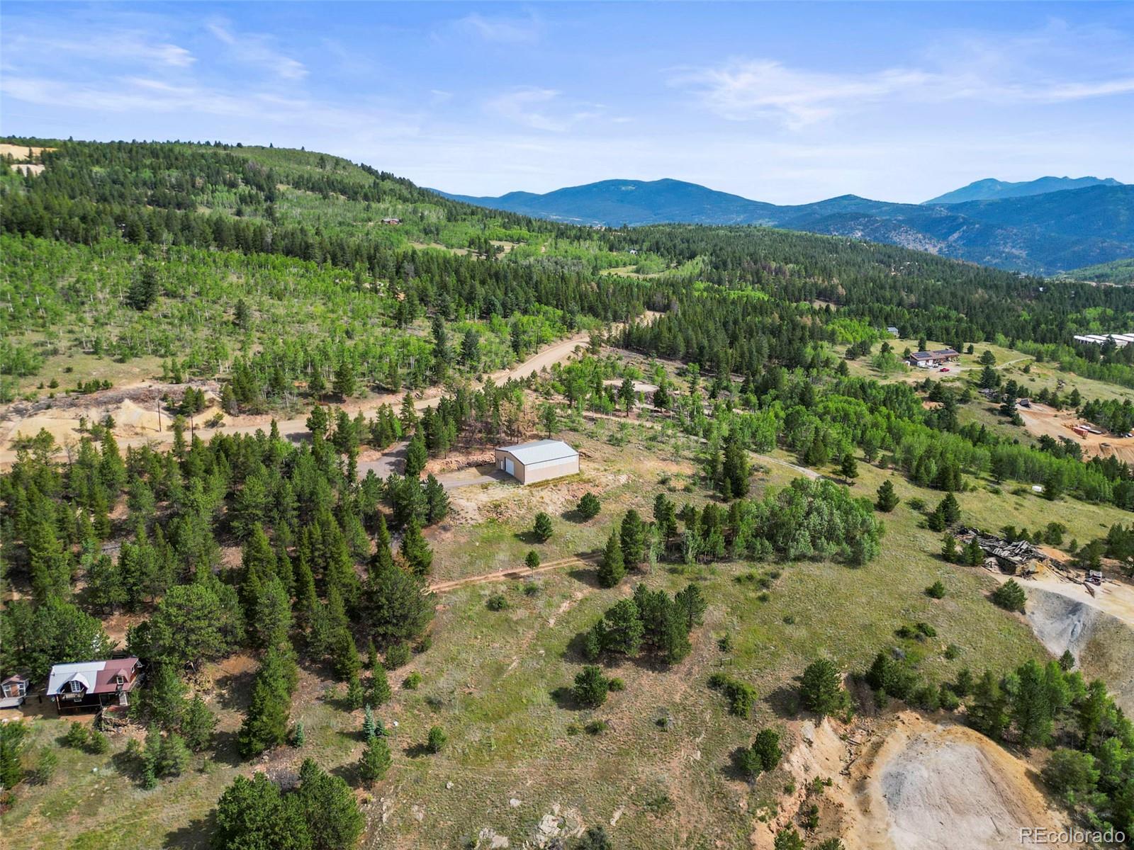6660 Virginia Canyon Road Central City, CO 80427 - Photo 10 of 31 a view of a city with mountain