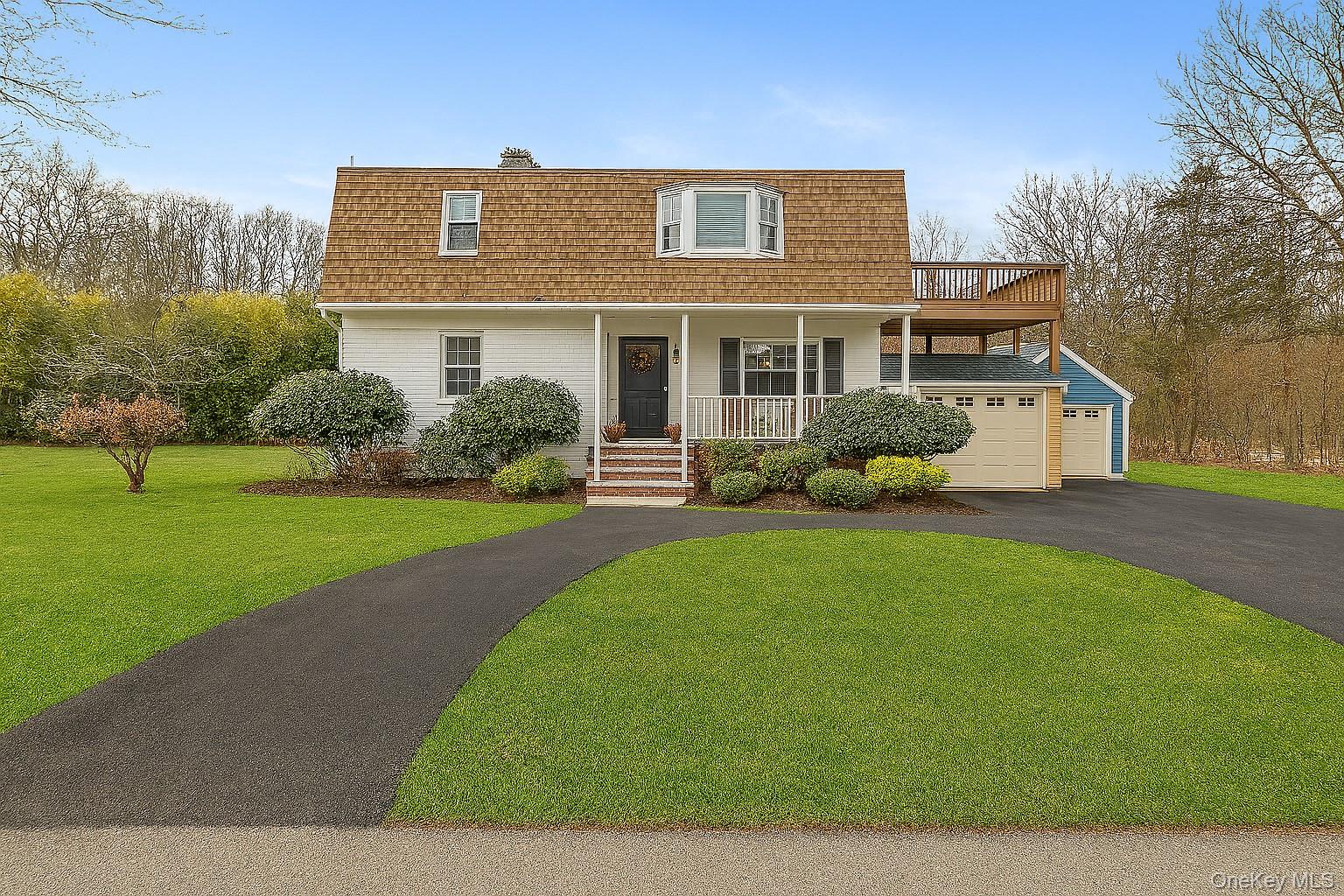 10 Helin Road Hopewell Junction, NY 12533 - Photo 1 of 35 Front of property Virtual -Spring Version featuring a Charming front porch, large "U" shaped driveway 2 garages