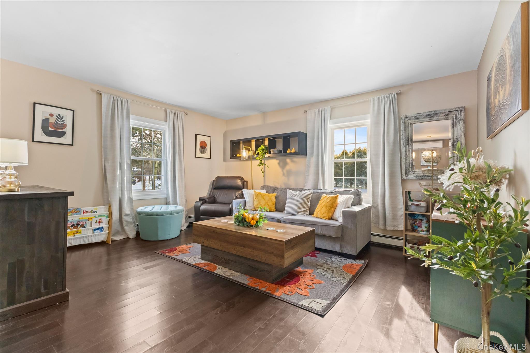 10 Helin Road Hopewell Junction, NY 12533 - Photo 8 of 35 Living room with healthy amount of natural light, wood-type flooring