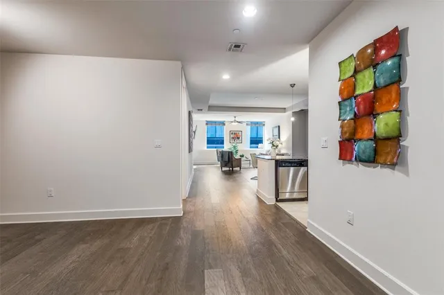a view of a living room and dining room