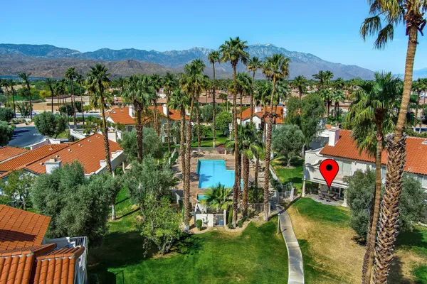 an aerial view of residential house and outdoor space