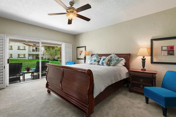 a bed room with a bed and a table