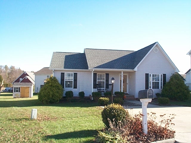 a house view with a outdoor space