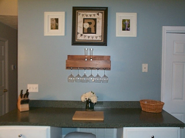 216 Rutledge Drive Waynesboro, VA 22980 - Photo 6 of 16 a room with painting on the wall and a potted plant