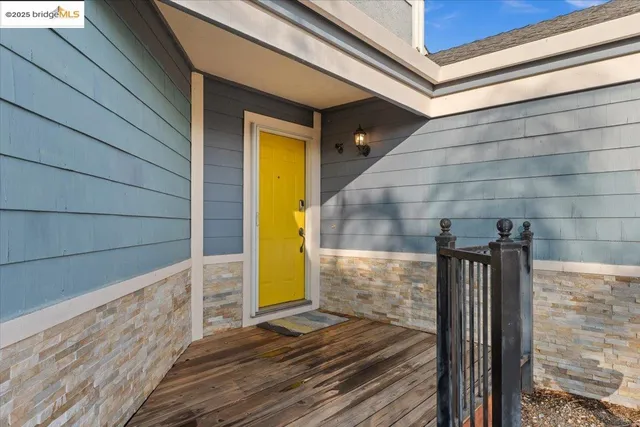 a bedroom with a bed and a table