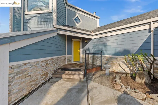 a bedroom with a bed and a table