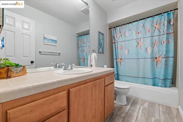 a white bath tub sitting next to a window