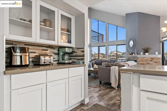 a kitchen with a sink and cabinets