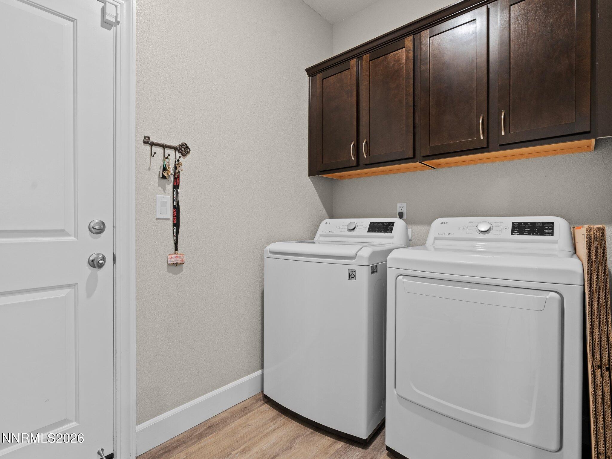1914 Sea Horse Road, Unit C Reno, NV 89521 - Photo 14 of 28 a utility room with dryer and washer