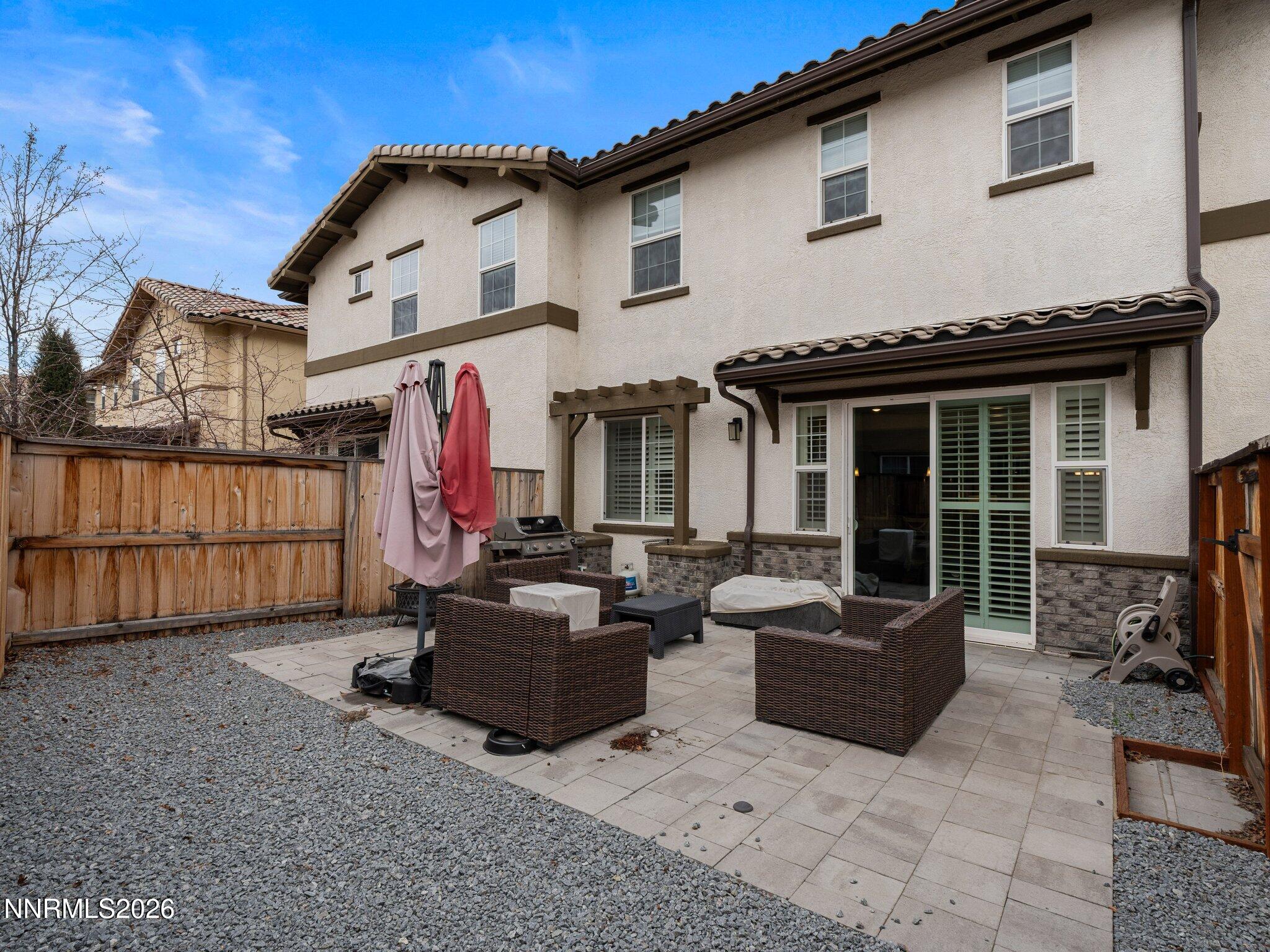 1914 Sea Horse Road, Unit C Reno, NV 89521 - Photo 26 of 28 a view of the house with couches in front of it
