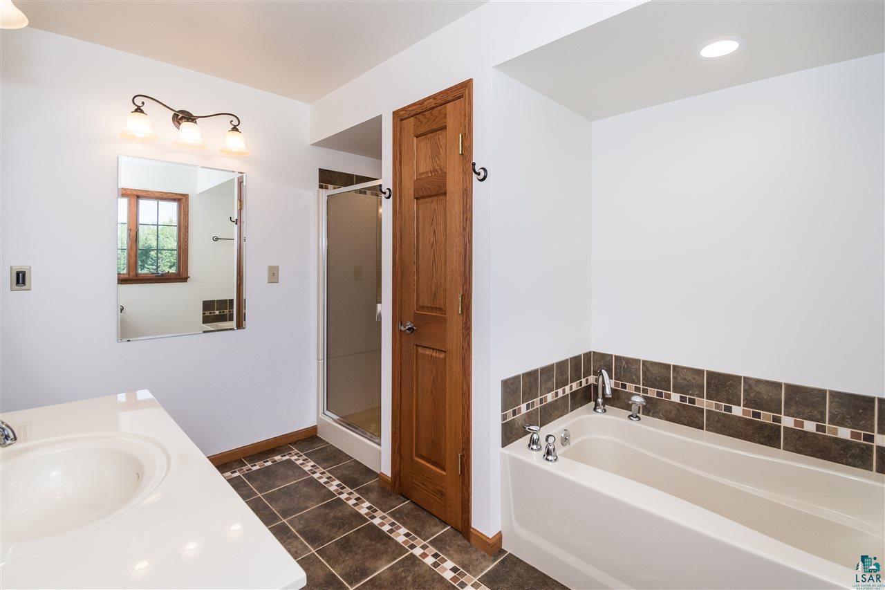 7223 County Road East South Range, WI 54874 - Photo 16 of 30 Full bath with tub and seperate shower