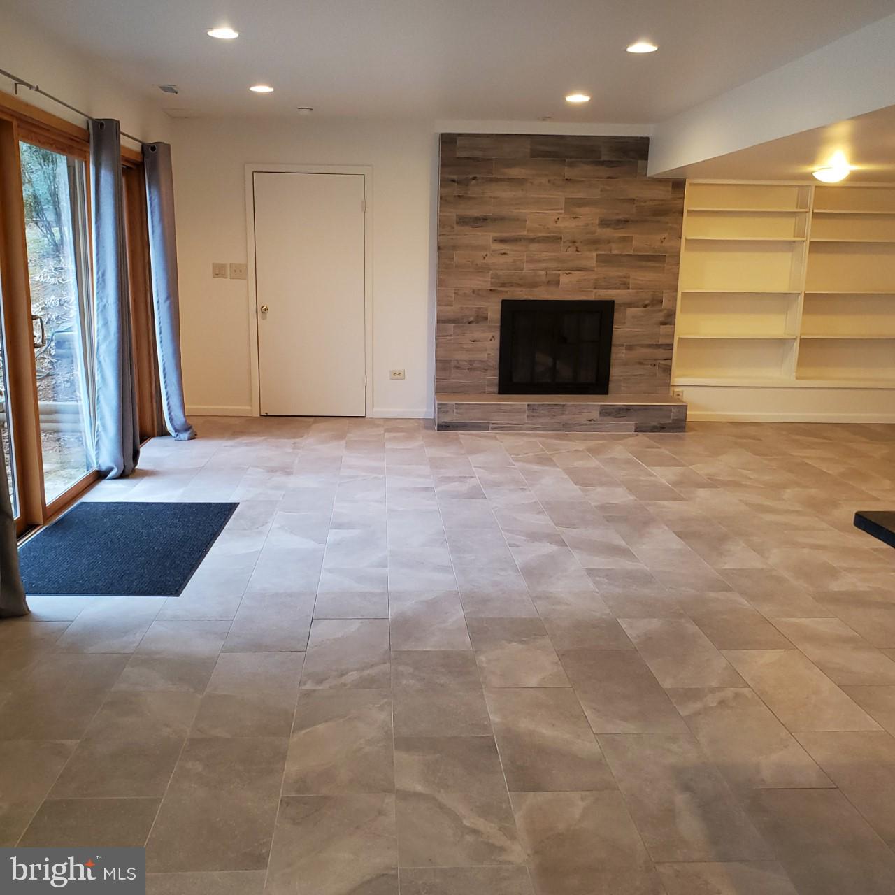 14901 Springfield Road Darnestown, MD 20874 - Photo 26 of 40 Lower Level Rec. Room with Fireplace