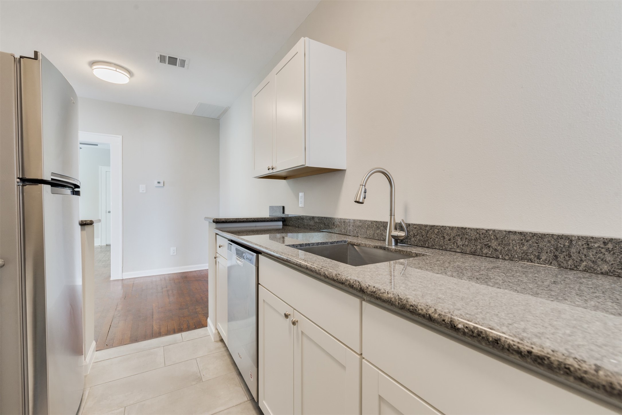 1219 West Gray Street, Unit 2 Houston, TX 77019 - Photo 20 of 25 a close view of sink and tap