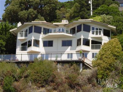 10 Cliff Road Belvedere, CA 94920 - Photo 11 of 21 a front view of a house with lots of trees