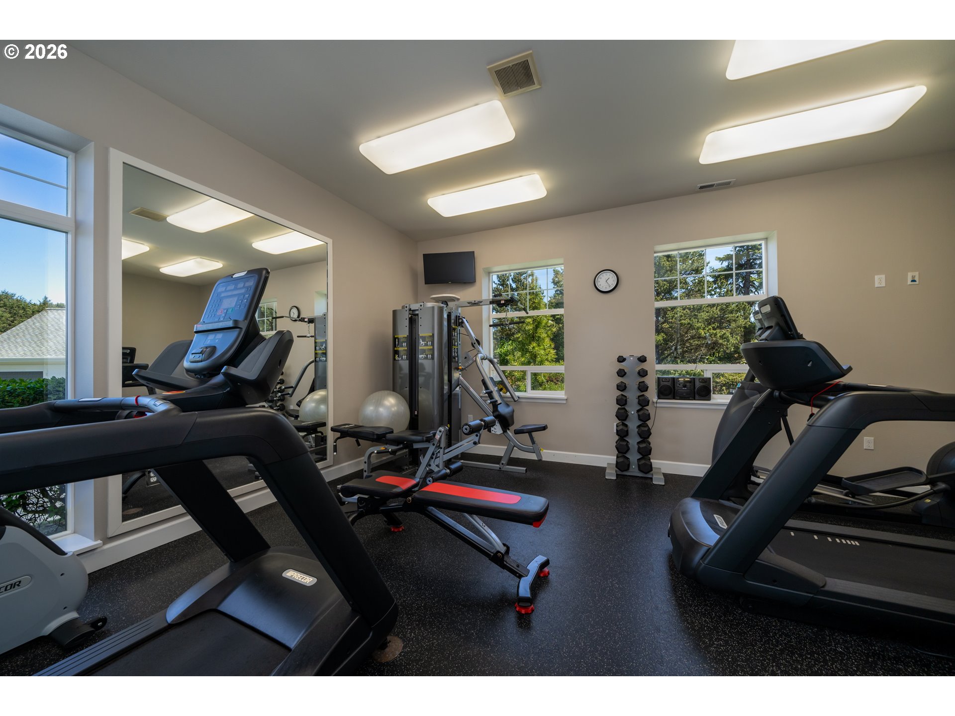 Southwest Cupola Place, Unit 132 South Beach, OR 97366 - Photo 18 of 28 a view of a room with gym equipment