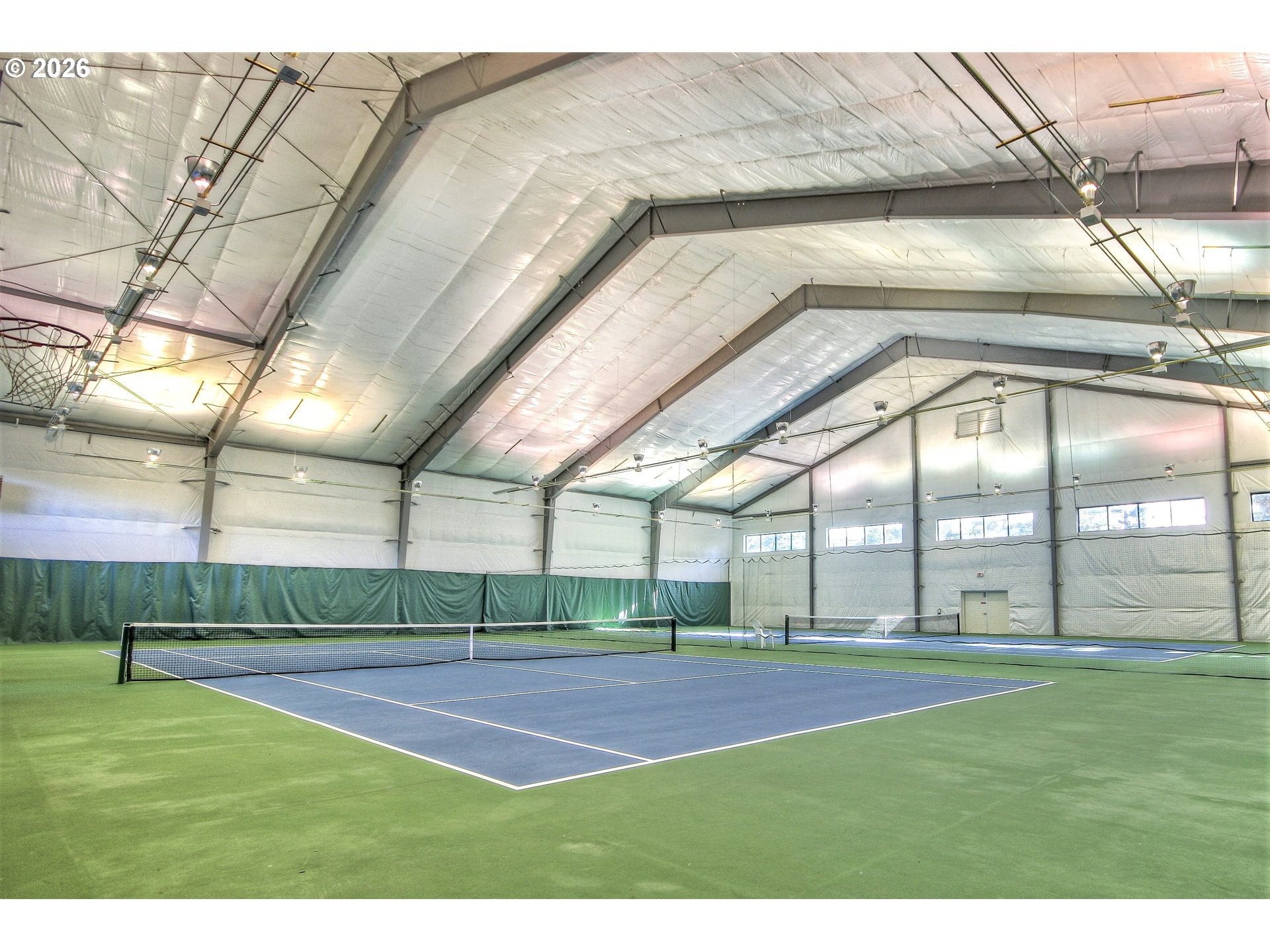 Southwest Cupola Place, Unit 132 South Beach, OR 97366 - Photo 20 of 28 a view of yard tennis court