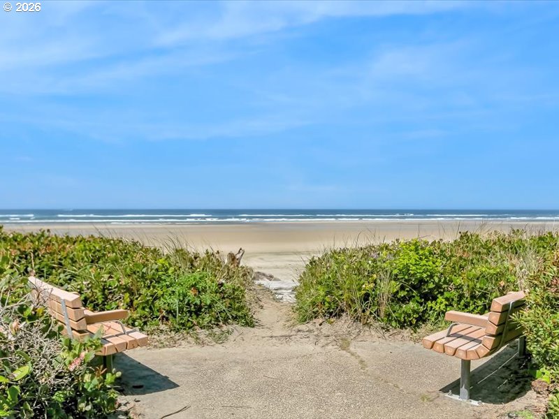 Southwest Cupola Place, Unit 132 South Beach, OR 97366 - Photo 25 of 28 a view of an ocean and a beach