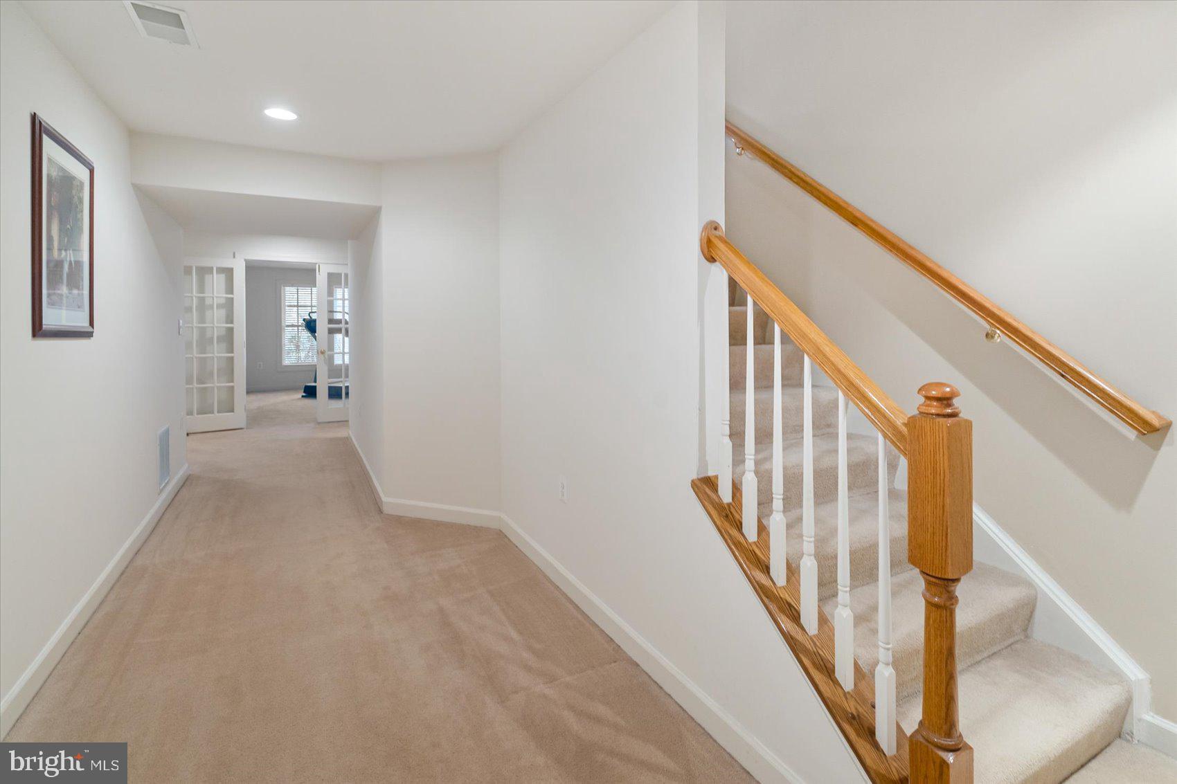 5115 Bright Owl Road Perry Hall, MD 21128 - Photo 41 of 74 Lower Landing Carpet - French Doors To Bonus Room