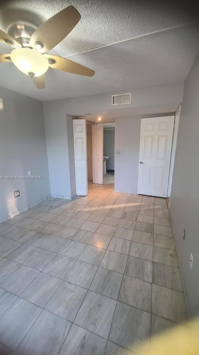 16220 Northwest 2nd Avenue, Unit 213 Miami, FL 33169 - Photo 20 of 22 a view of an empty room