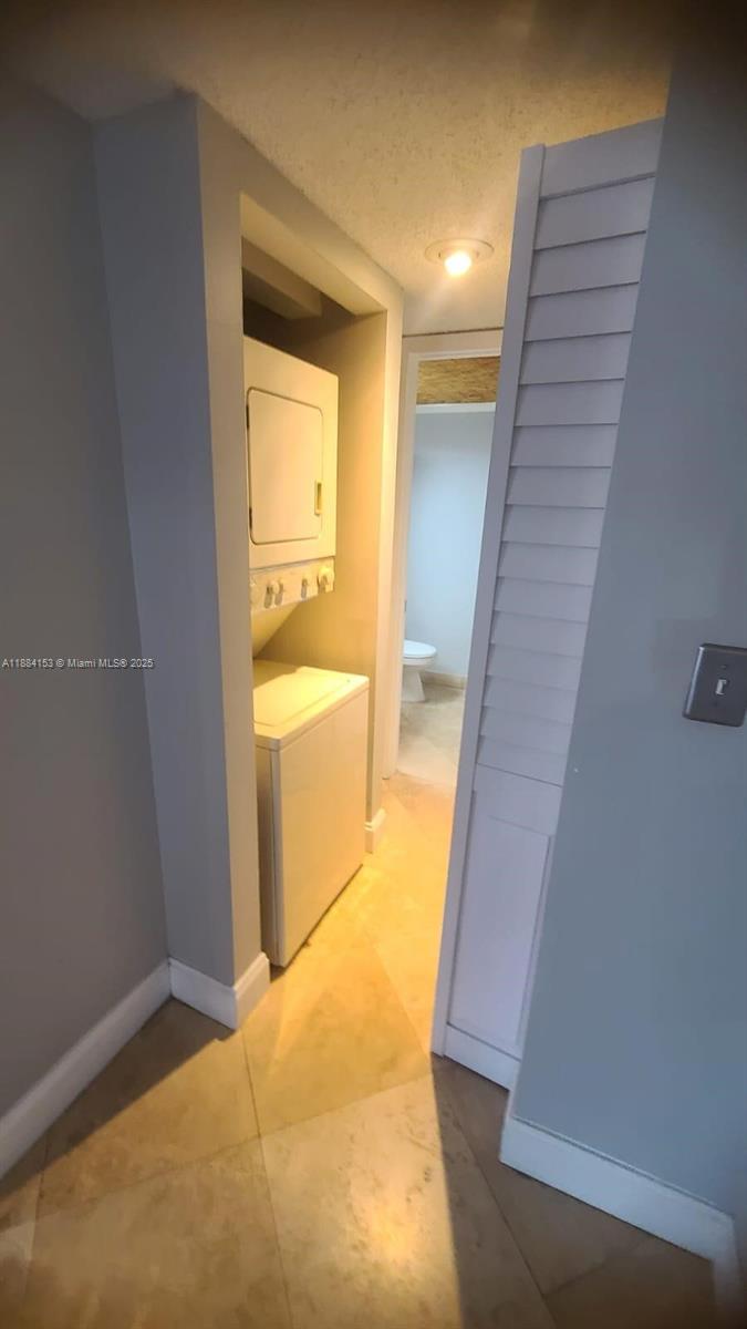 16220 Northwest 2nd Avenue, Unit 213 Miami, FL 33169 - Photo 7 of 22 a bathroom with a tub and sink