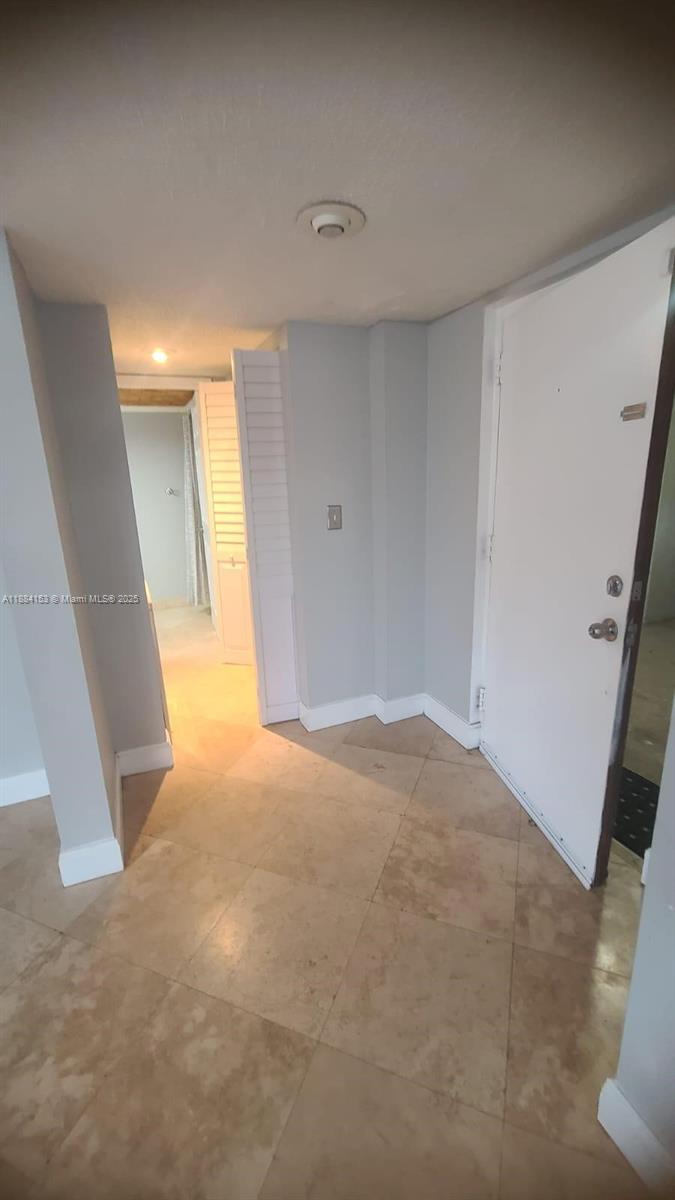 16220 Northwest 2nd Avenue, Unit 213 Miami, FL 33169 - Photo 9 of 22 a view of an empty room
