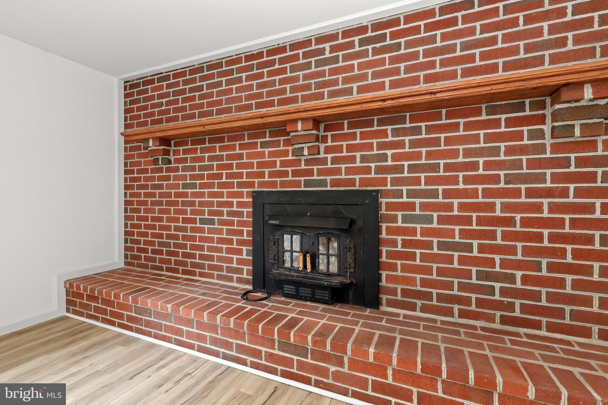 5773 Oakland Road Sykesville, MD 21784 - Photo 36 of 57 Brick wood fireplace