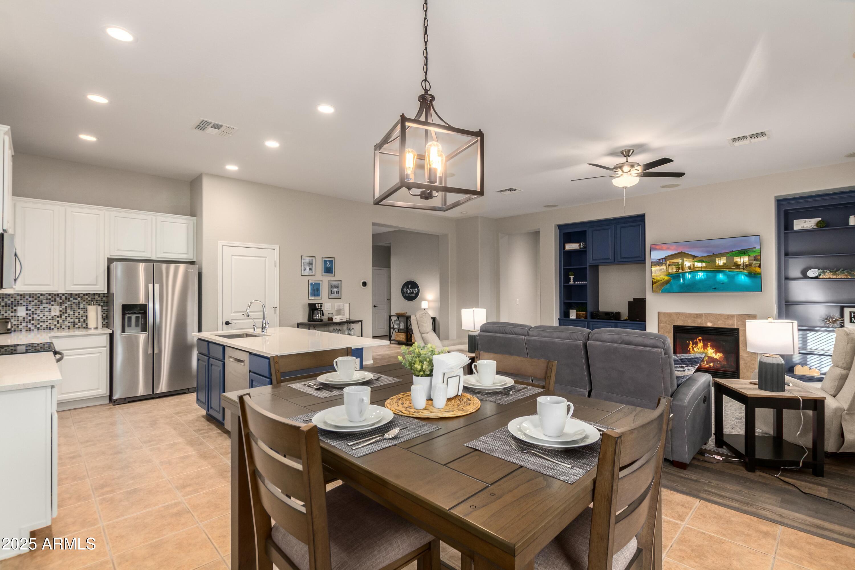3419 West Zuni Brave Trail Phoenix, AZ 85086 - Photo 14 of 51 a view of a dining room with furniture