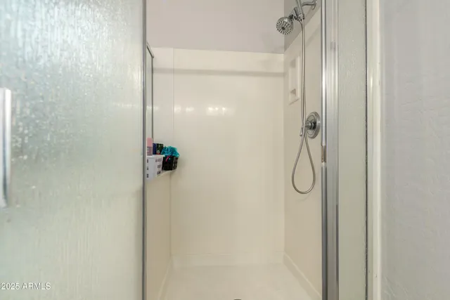 a bathroom with a bathtub and a window