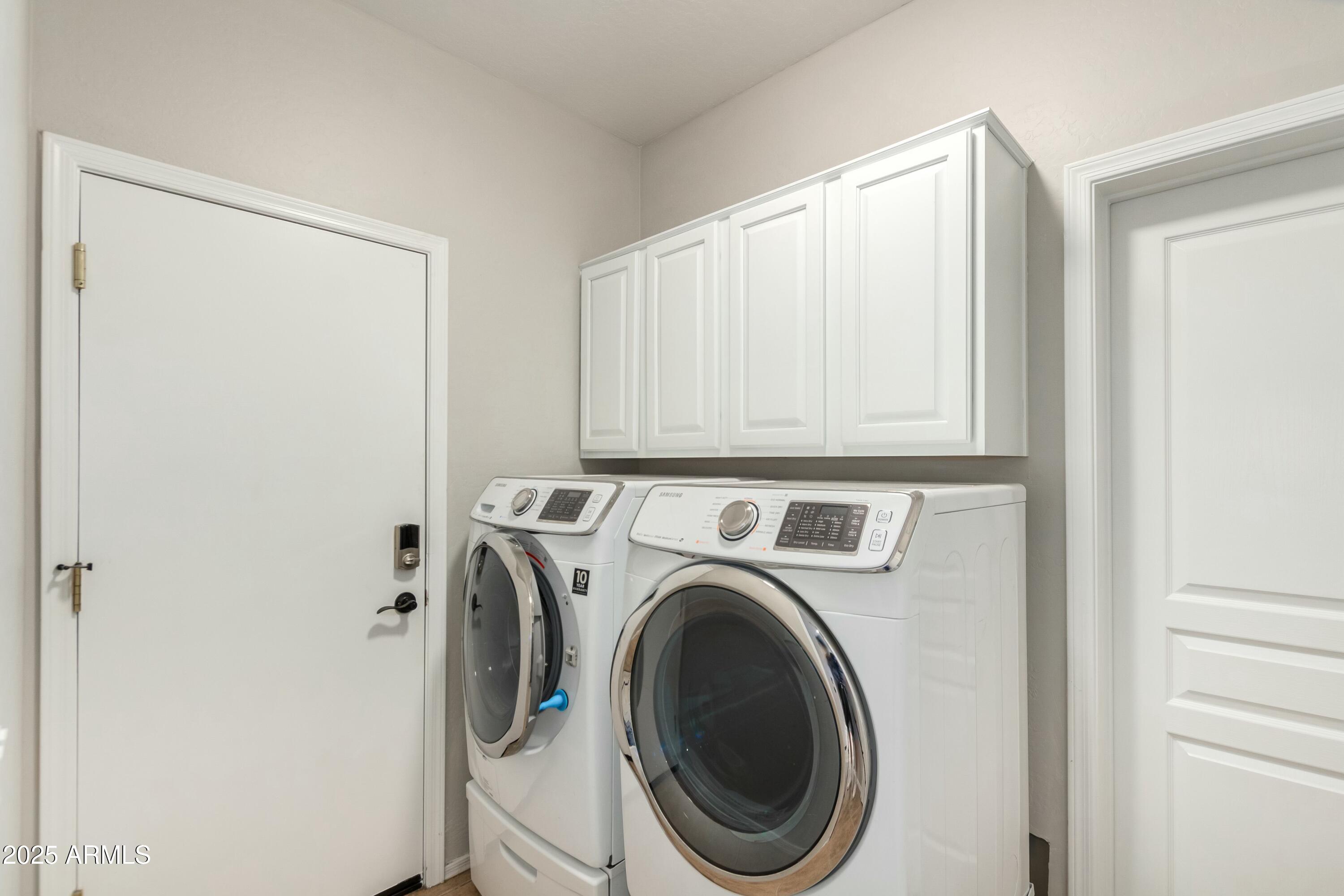 3419 West Zuni Brave Trail Phoenix, AZ 85086 - Photo 28 of 51 a view of entryway with washer and dryer
