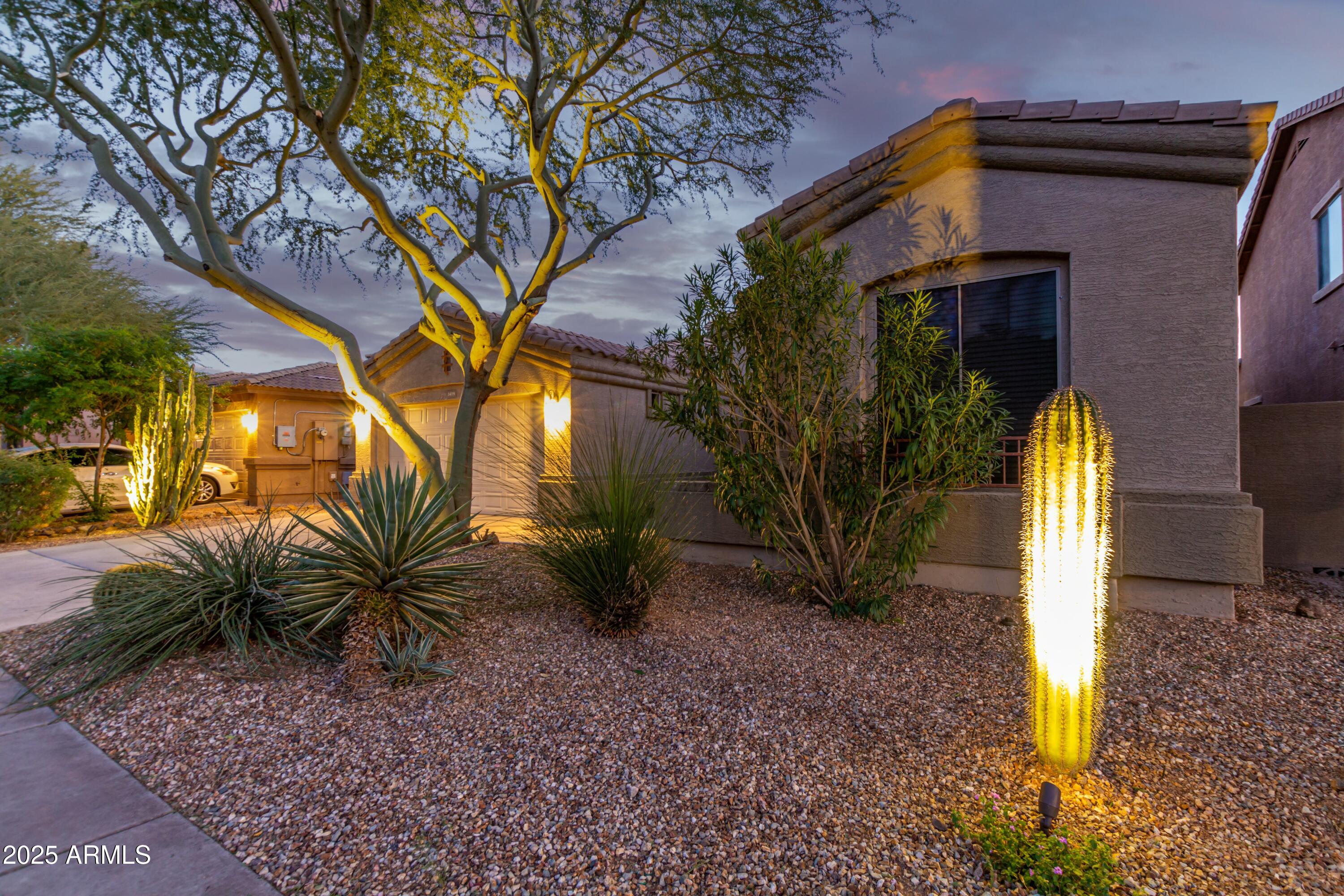 3419 West Zuni Brave Trail Phoenix, AZ 85086 - Photo 42 of 51 a view of a house with a yard