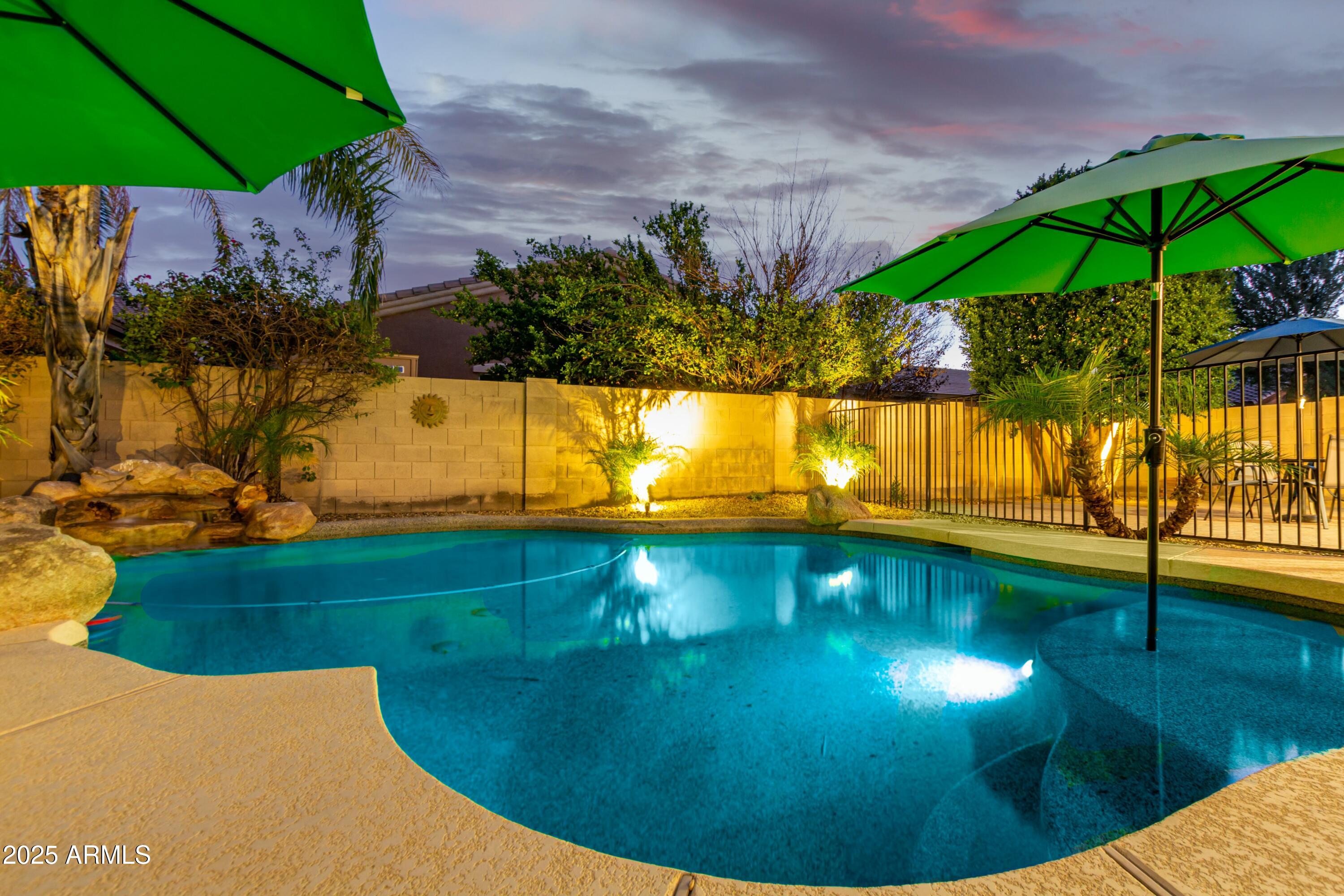 3419 West Zuni Brave Trail Phoenix, AZ 85086 - Photo 45 of 51 a view of a swimming pool with a patio