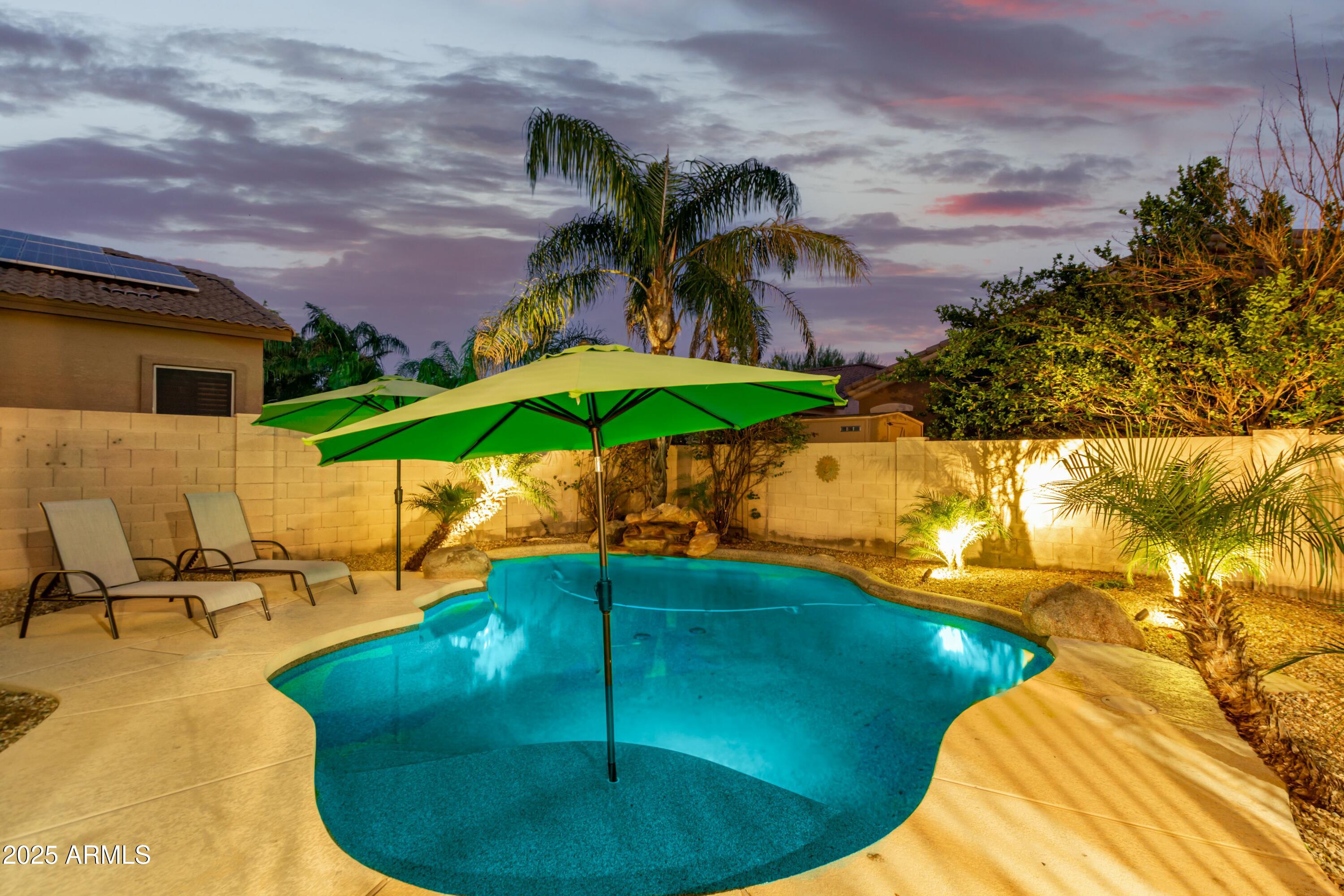 3419 West Zuni Brave Trail Phoenix, AZ 85086 - Photo 46 of 51 a view of a swimming pool with a patio