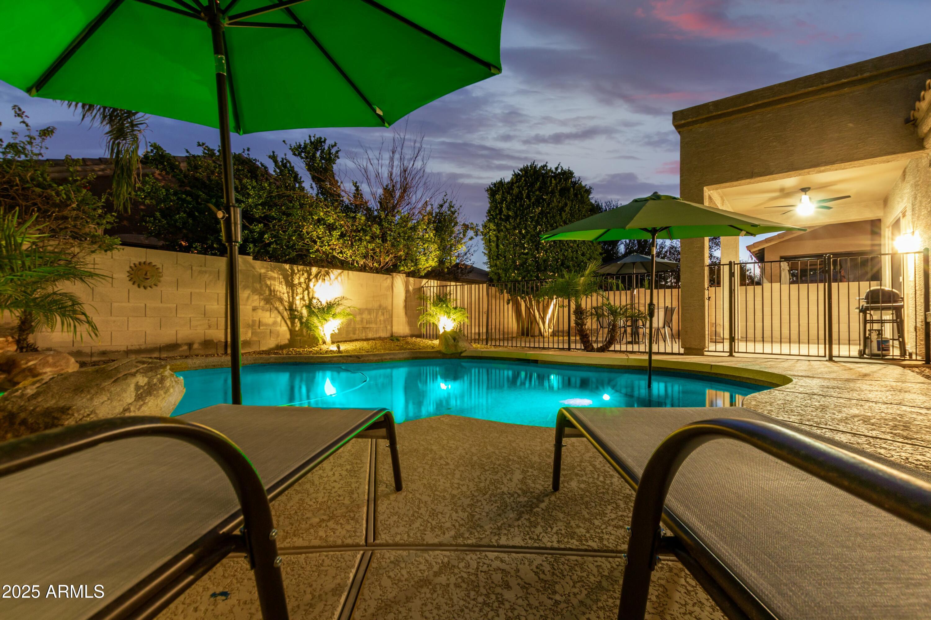 3419 West Zuni Brave Trail Phoenix, AZ 85086 - Photo 48 of 51 swimming pool view with a seating space