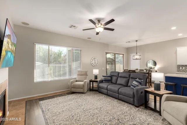 a living room with furniture and a window
