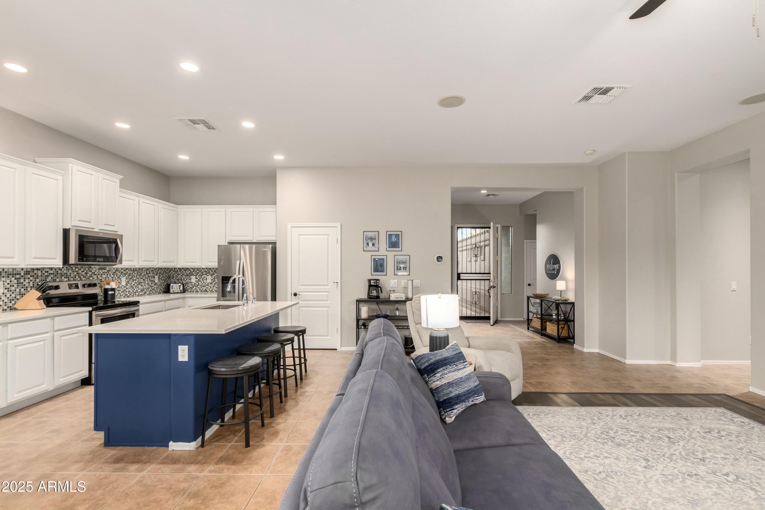 3419 West Zuni Brave Trail Phoenix, AZ 85086 - Photo 10 of 51 a large kitchen with lots of counter top space