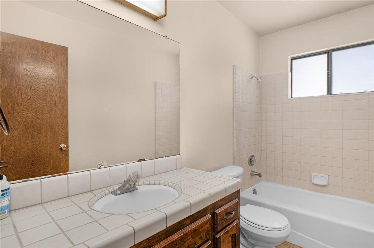 28340 Tollhouse Road Tollhouse, CA 93667 - Photo 11 of 37 a bathroom with a granite countertop sink toilet and shower