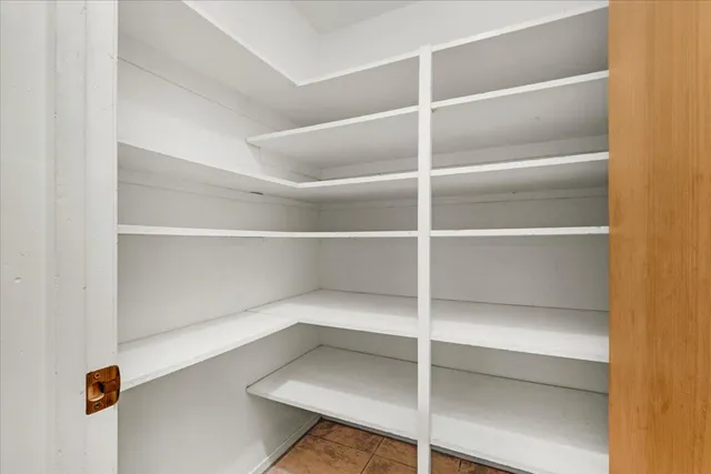 a view of an empty walk in closet