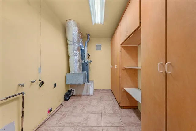 a view of a bathroom from a hallway