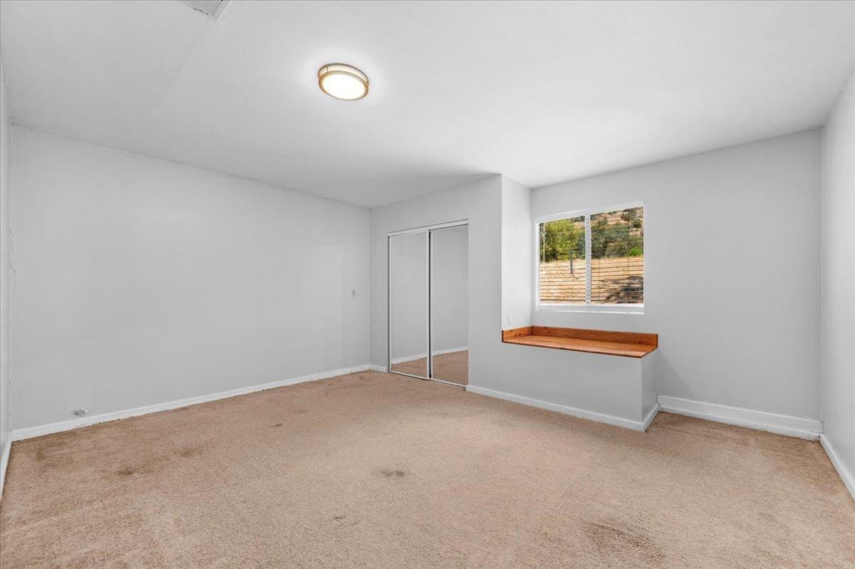 28340 Tollhouse Road Tollhouse, CA 93667 - Photo 21 of 37 an empty room with windows and closet