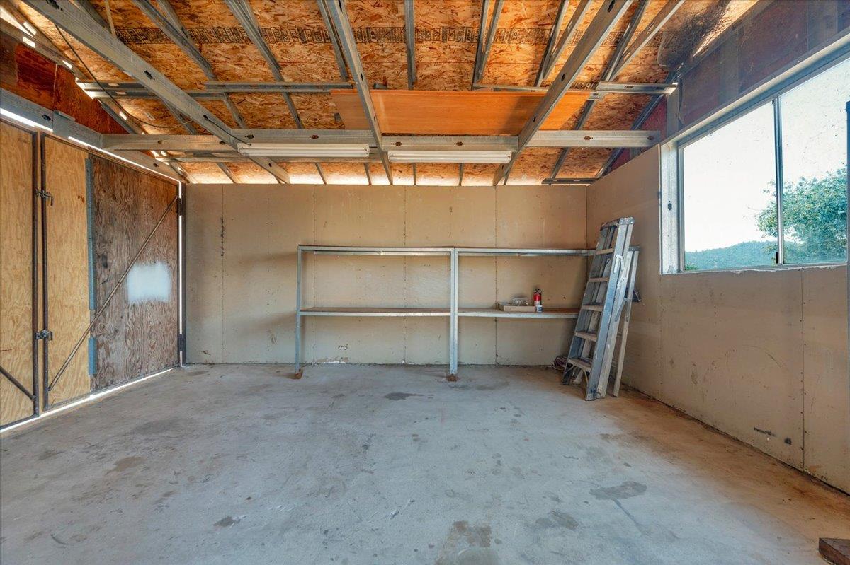 28340 Tollhouse Road Tollhouse, CA 93667 - Photo 23 of 37 a view of an empty room with a garage